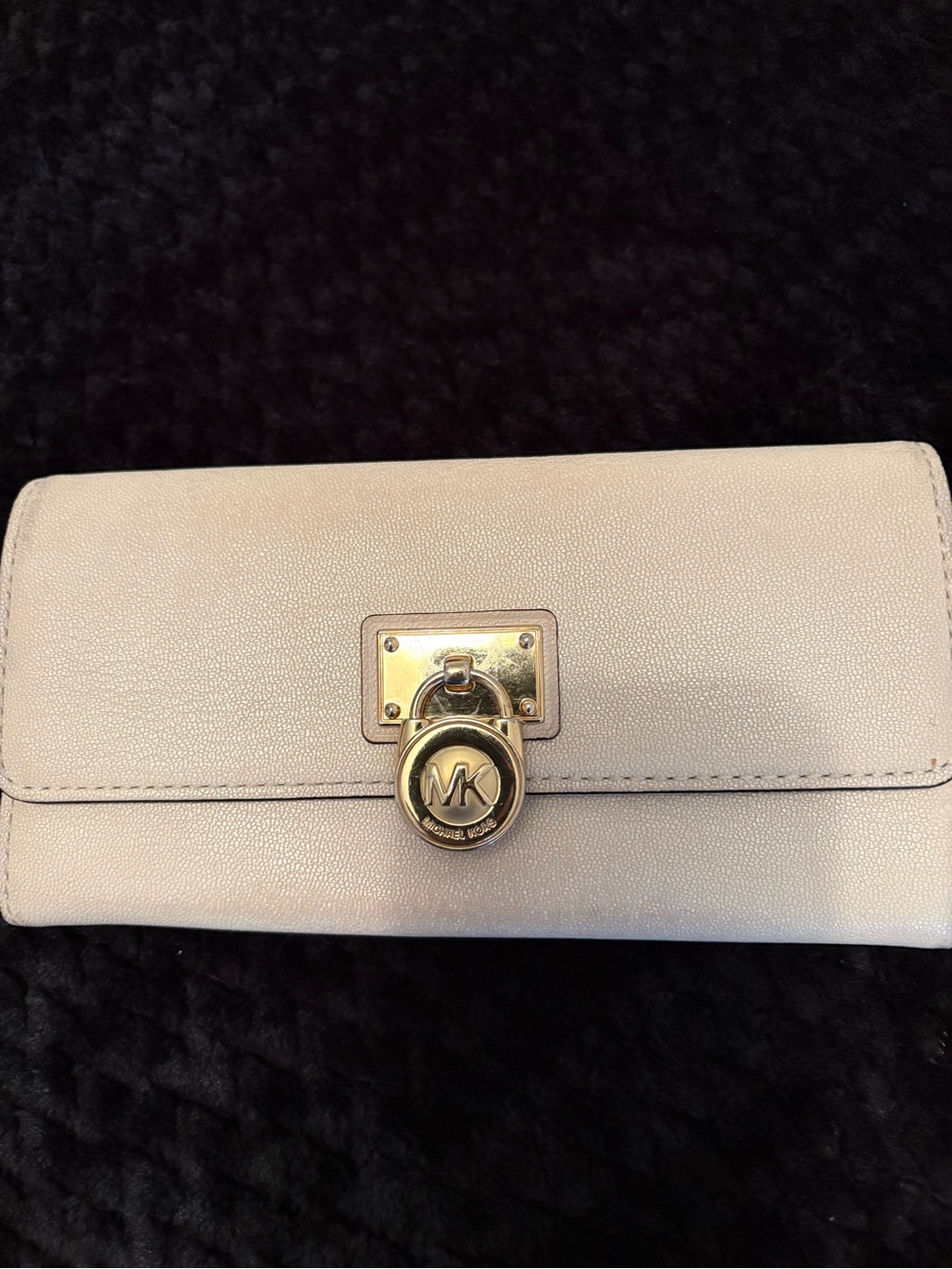 Michael Kor’s beige Wallet